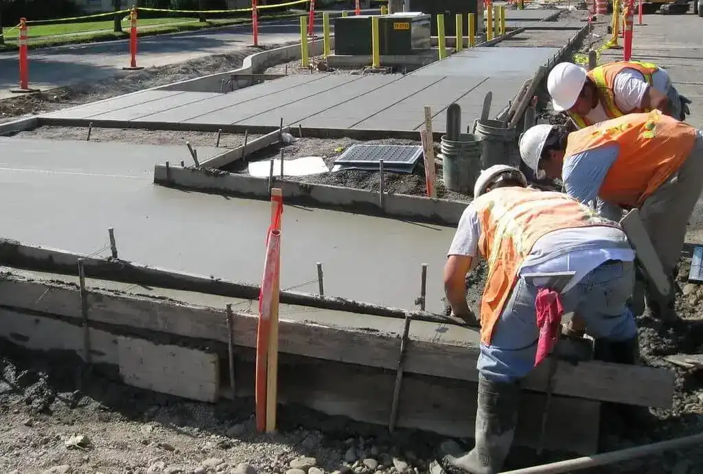 Concrete company crew pouring new concrete foundation in Austell GA