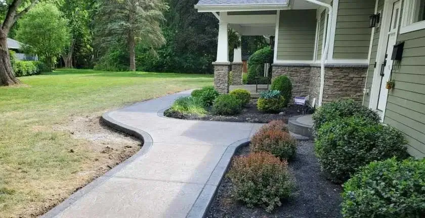 Concrete Sidewalk leading to a front porch in Mableton GA