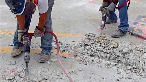 concrete slab damage evaluation for repair vs resurfacing cost planning